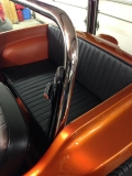 back seat, finished stainless steel rollbar